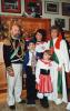 Al Salone: il Generale Mania Piero e la Mugnaia Noro Angela appongono la coccarda ale Maschere Giolito Maria Grazie con i figli Marangon Enrico ed Eliana.