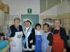 Nella cucina del salone il segretario Marco con la cuoca Elsa e con Teresa, Ortensia e Elsa